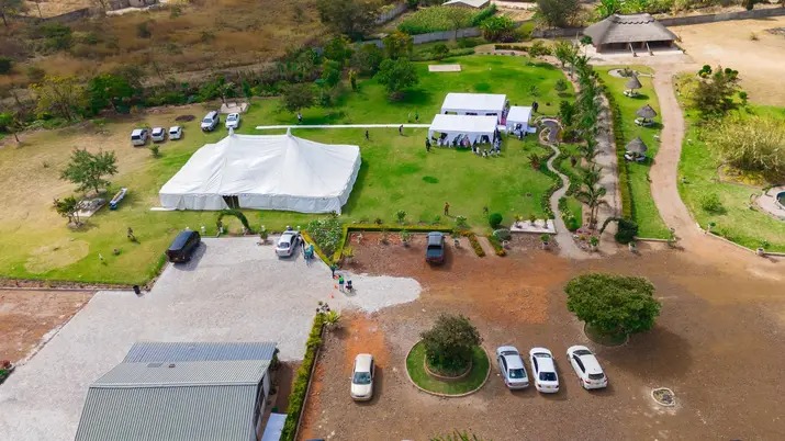 Aerial shot of a wedding venue with marquee tents